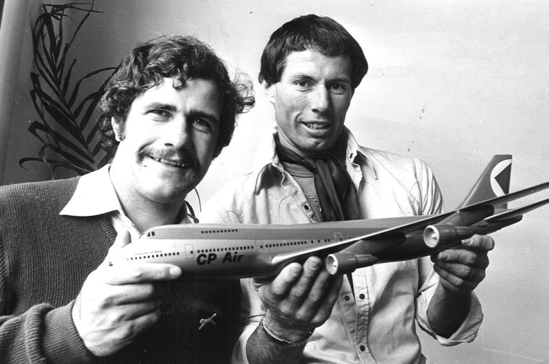 1977. Hawthorn's Don Scott presents teammate Leigh Matthews with the VFL Players Association's best player award. Neg: KJ15148