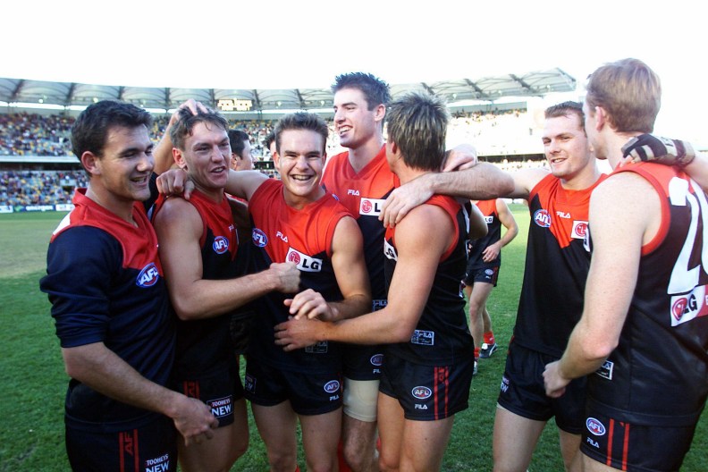 ## HAVE YOU /CHECKED COPYRIGHT /CLEARANCE ??  07 Jul 2002 Happy Demons after  Lions vs Melbourne game at the Gabba - AFL - PicAnthony/Weate sport profile